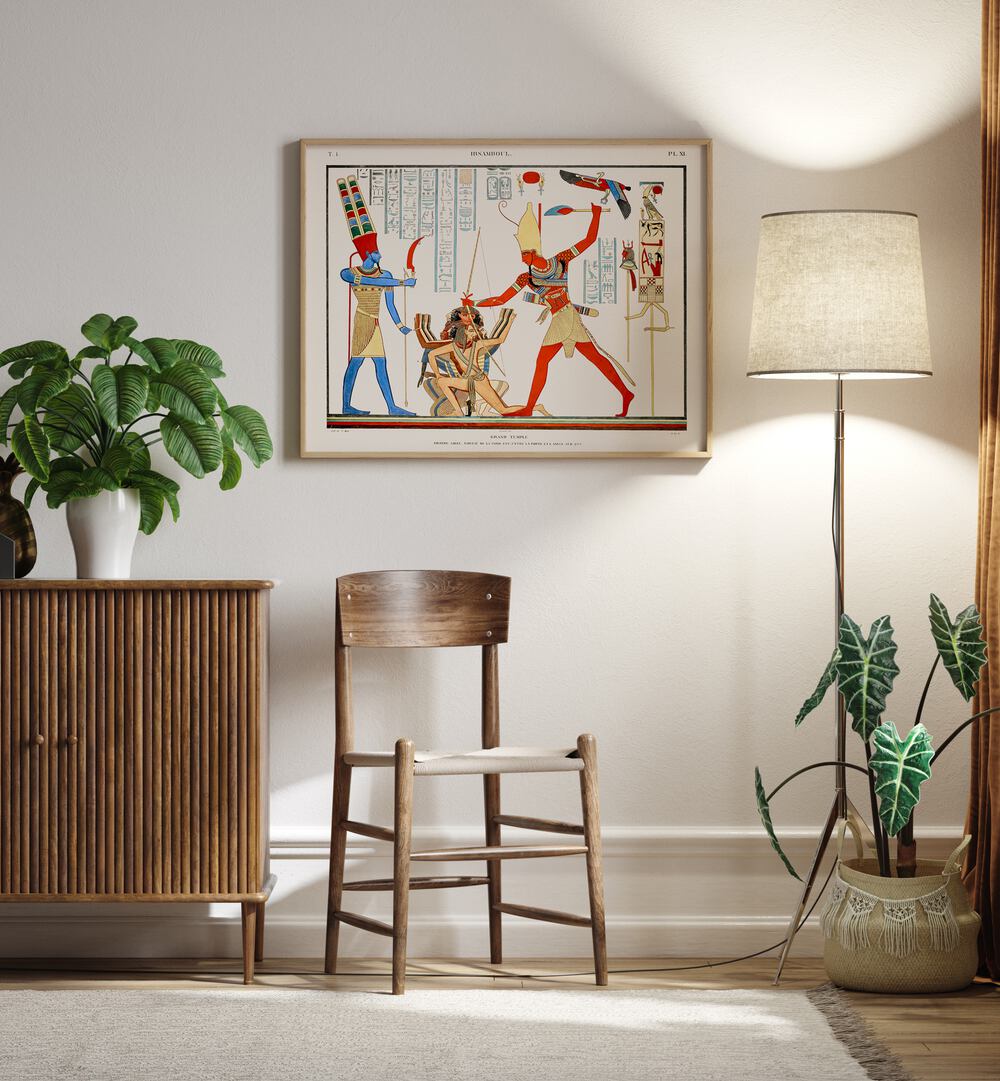 Grand Temple Artwork Egyptian Cultural Art Painting Artwork in plain oakwood frame on a white wall next to a lamp