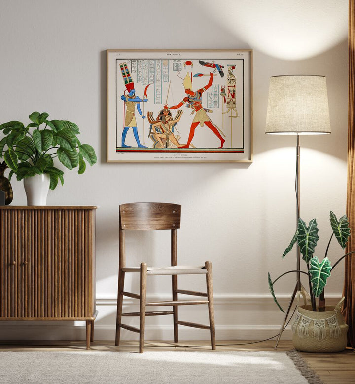 Grand Temple Artwork Egyptian Cultural Art Painting Artwork in plain oakwood frame on a white wall next to a lamp