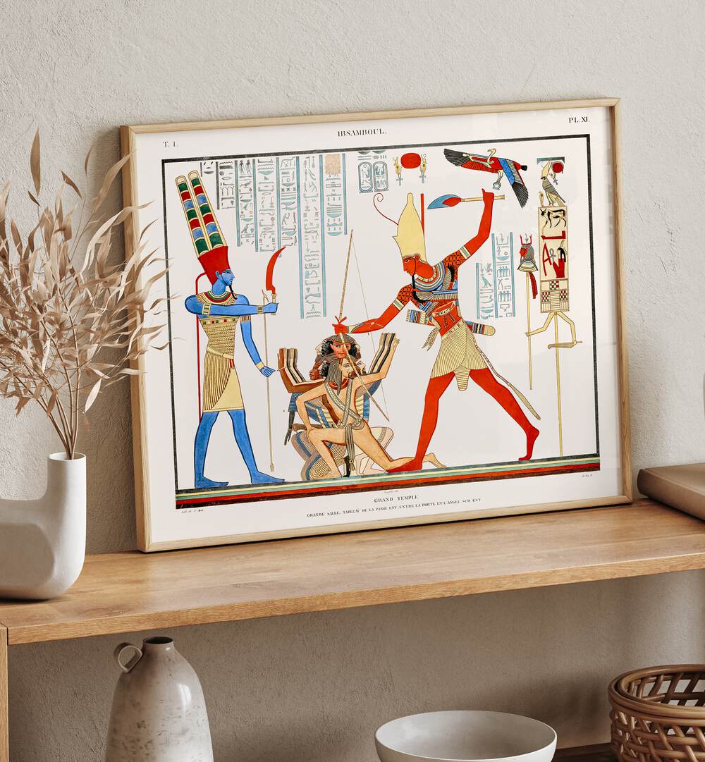 Grand Temple Artwork Egyptian Cultural Art Painting Artwork in plain oakwood frame on a table next to a flower pot