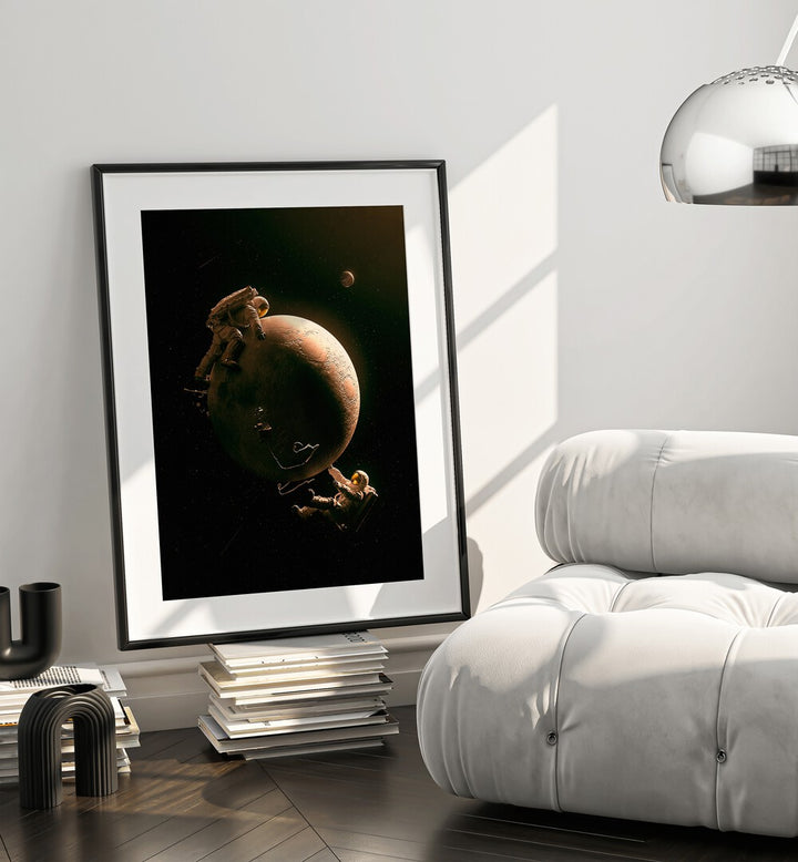 Gravity Play By Francis Minoza Astronaut & Nasa Paintings, Space Art Prints Artwork in Black Frame With Mount placed near a White Sofa in the Drawing Room
