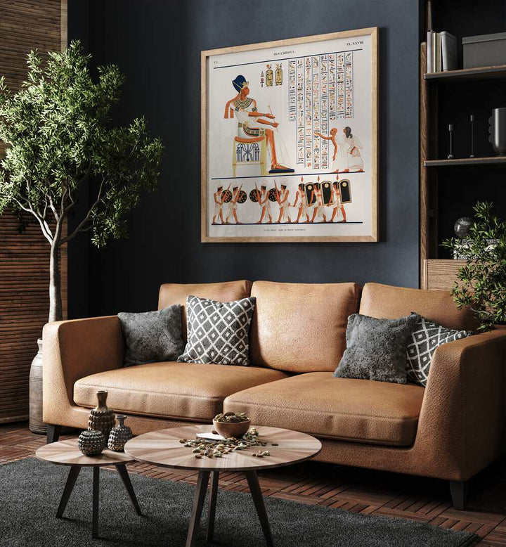 Great Speos North Wall Artwork Egyptian Cultural Art Painting Artwork in oakwood plain frame behind a sofa for living room