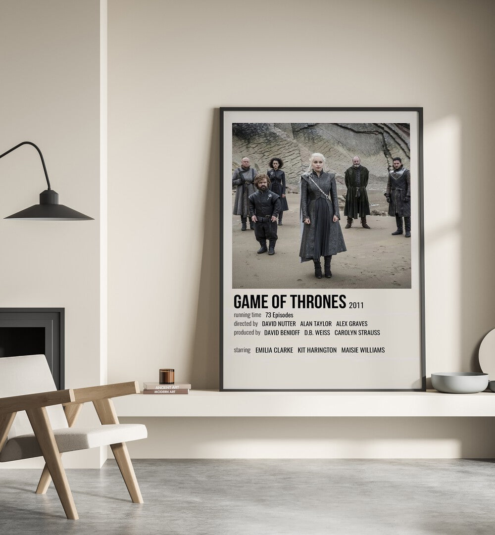 Game Of Thrones 2011 I Movie Posters in Black Plain Frame placed on a shelf beside a hearth