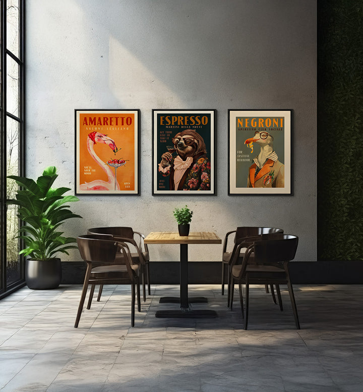 Dining area with a table and chairs, featuring three framed posters on the wall.