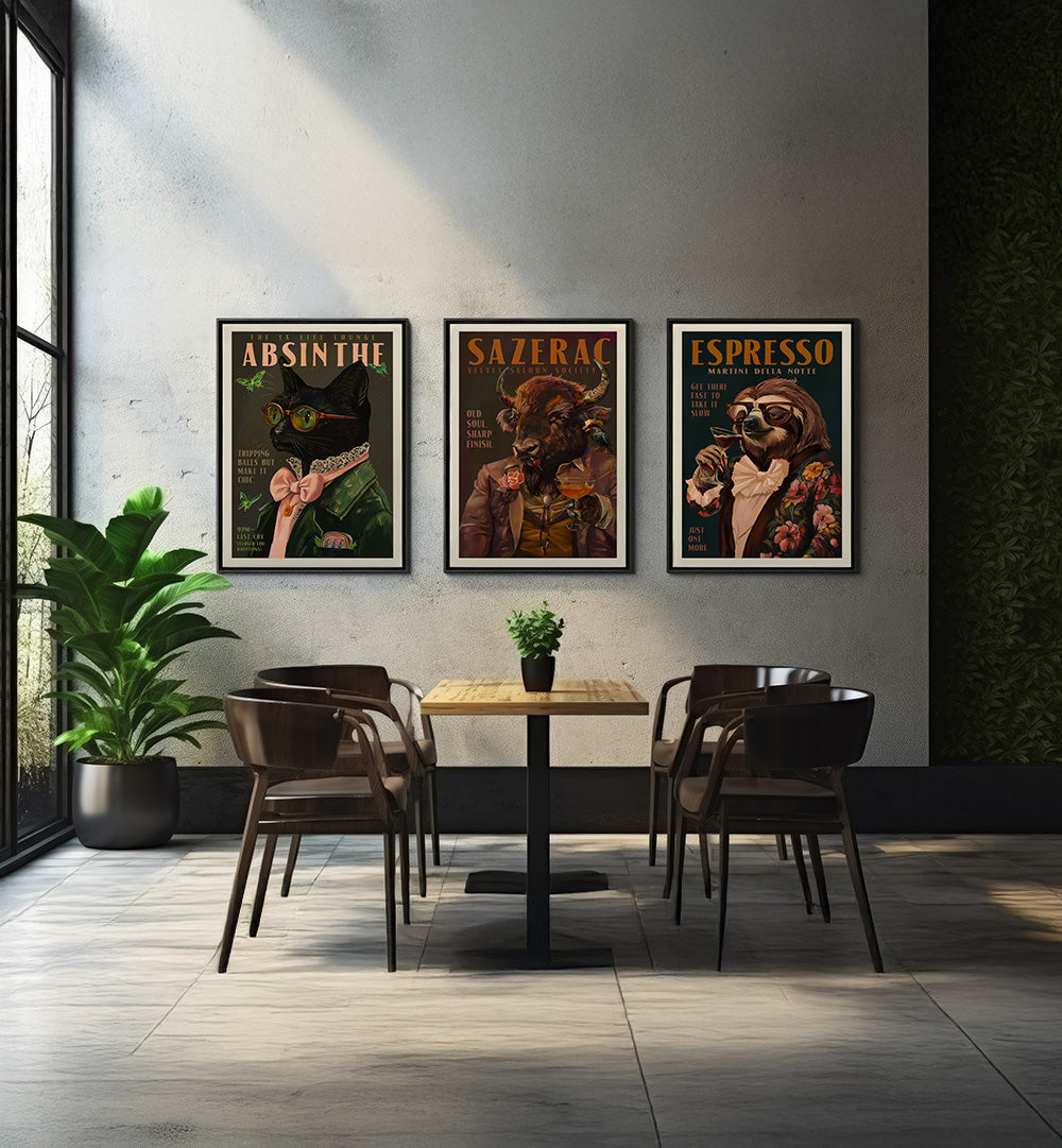 Modern interior with a table and chairs, featuring three framed posters on the wall.