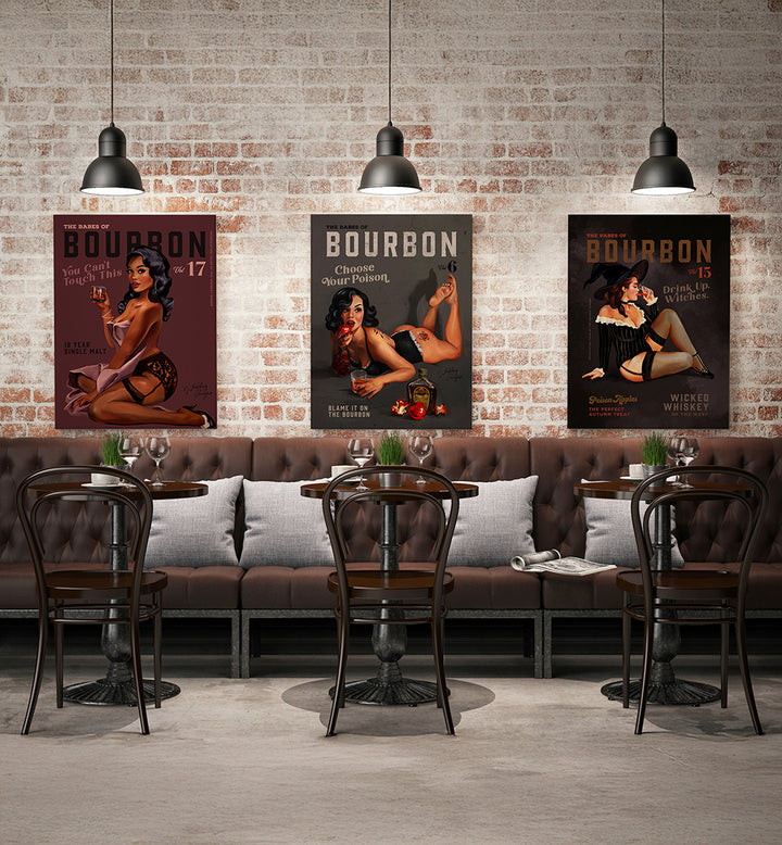 Three Bourbon posters on a brick wall above a bar with chairs and a couch.
