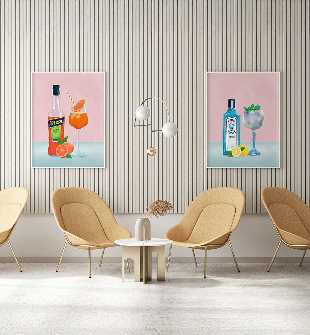 Modern interior with beige chairs, a small table, and two framed cocktail posters on a striped wall.