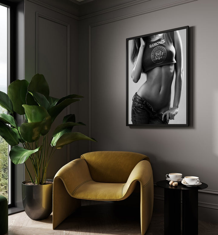 Go Love It by David Drake Fine Art Photography Fashion Photography in Black Plain Frame placed on a wall behind a yellow chair