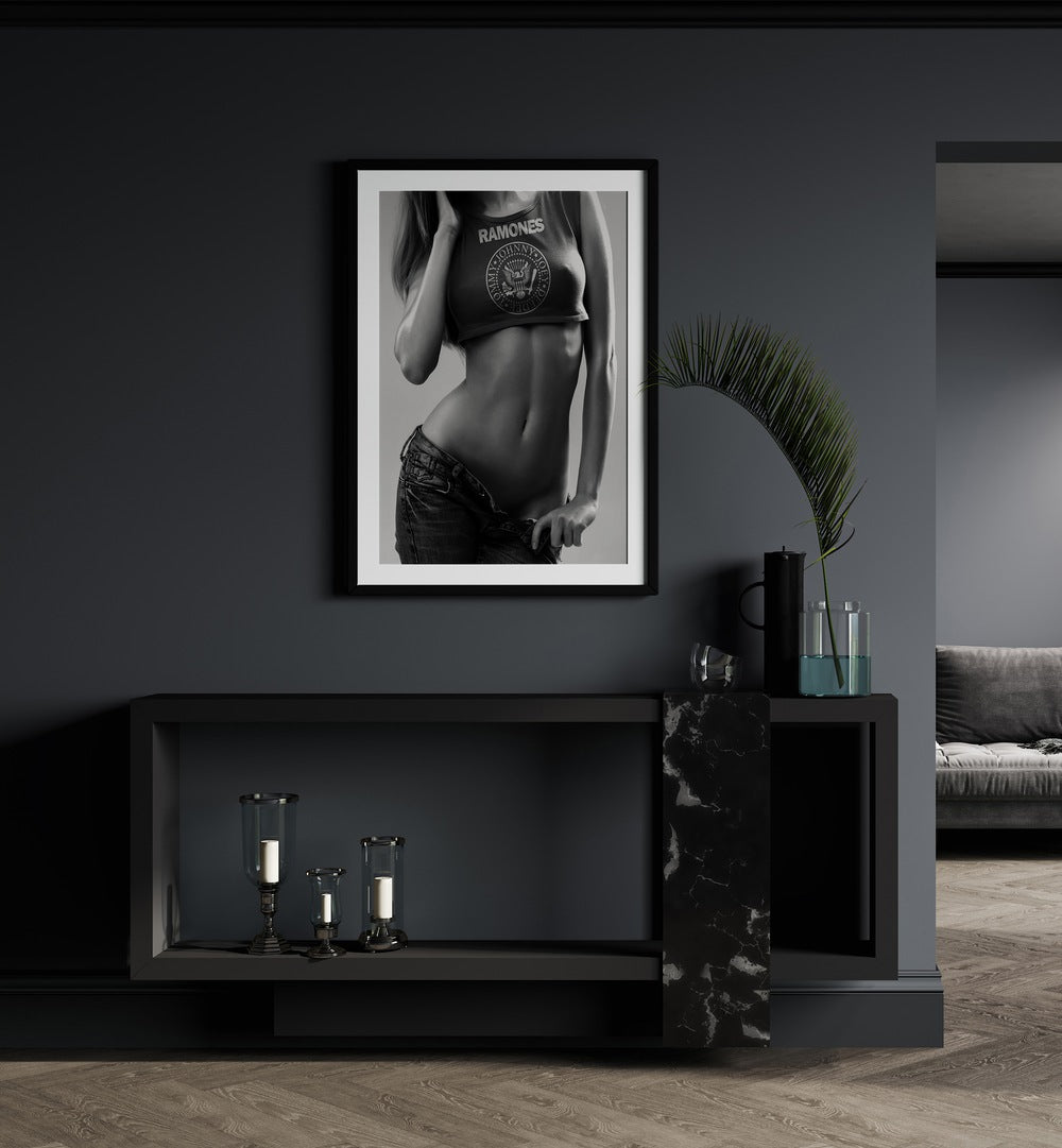 Go Love It by David Drake Fine Art Photography Fashion Photography in Black Frame With Mount placed on a wall behind a table