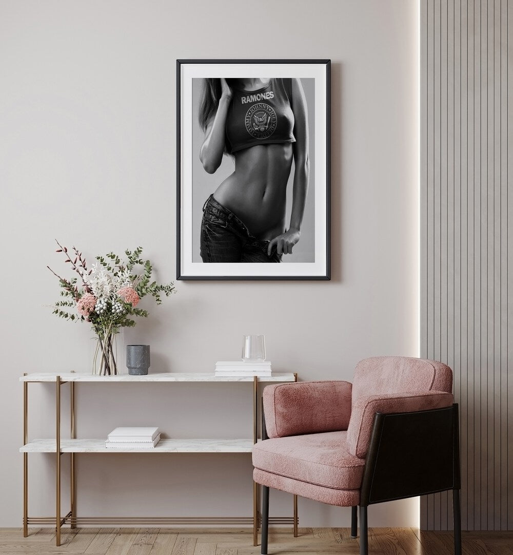 Go Love It by David Drake Fine Art Photography Fashion Photography in Black Frame With Mount placed on a wall behind a table