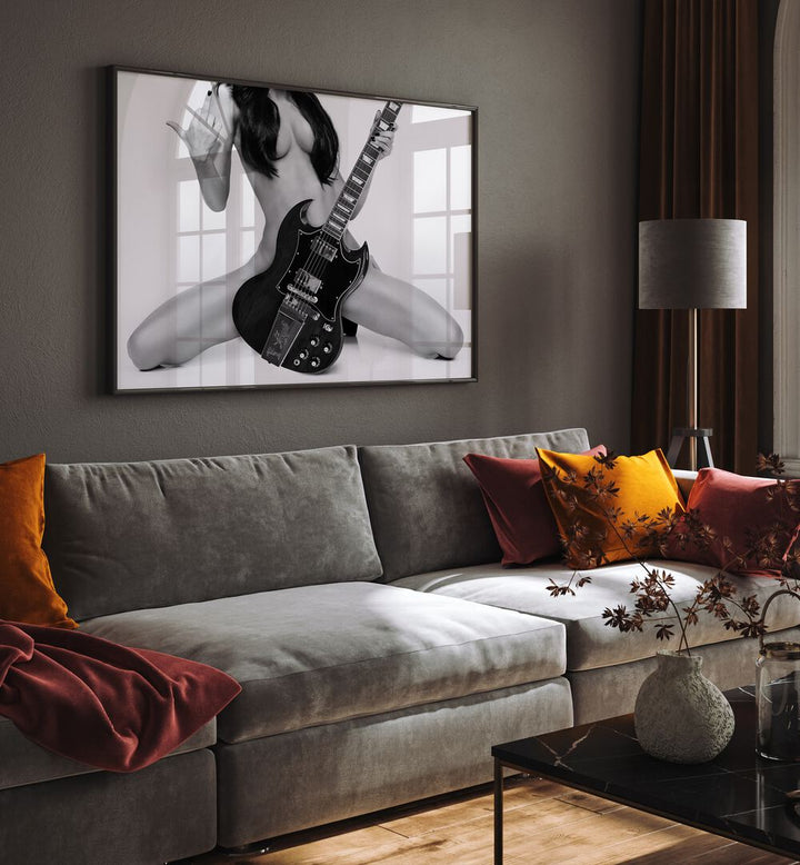 Go Rock Yourself by David Drake Fine Art Photography Fashion Photography in Black Plain Frame placed on a living room wall behind a sofa