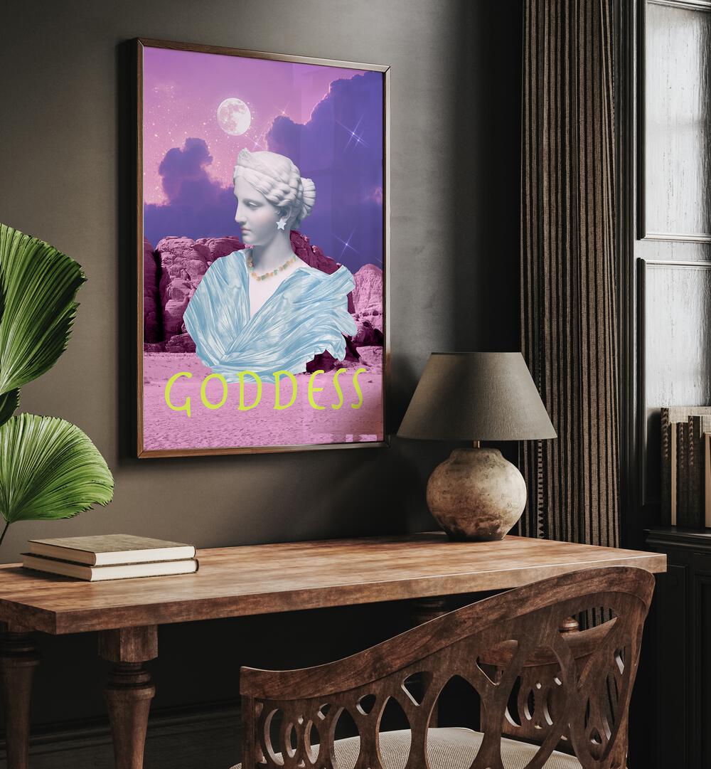 Goddess by Grace Digital Art Co Altered Art Prints in Dark Wood Plain Frame placed on a wall behind a study table