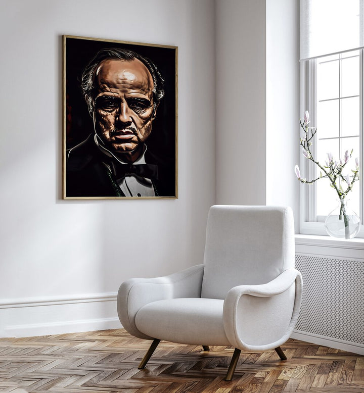 Godfather Art I Movie Posters in Oak Wood Plain Frame placed on a White Colored Wall near a White Sofa Chair in the Drawing Room