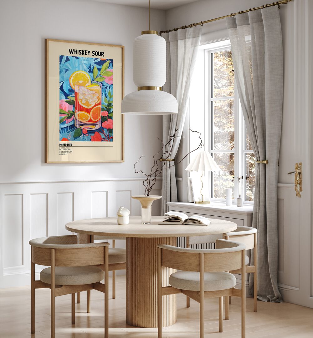 Golden Elegance Whiskey Sour Cafe Art Prints Cafe Posters in Oak Wood Plain Frame placed on a wall in a dining room area beside a window and behind a dining table