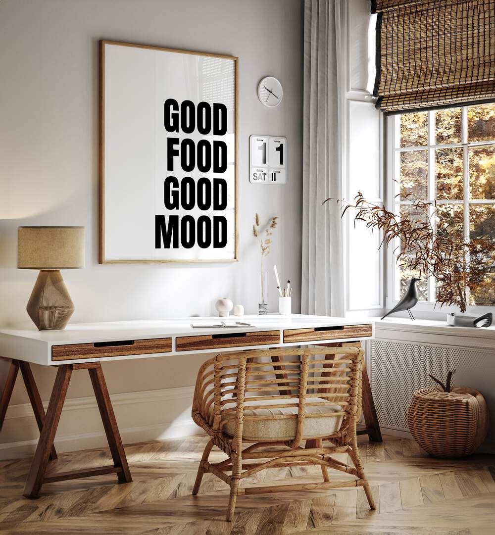 Good Food Good Mood by Athene Fritsch Quotes and Typography Posters in Oak Wood Plain Frame placed on a wall behind a study table and beside a window