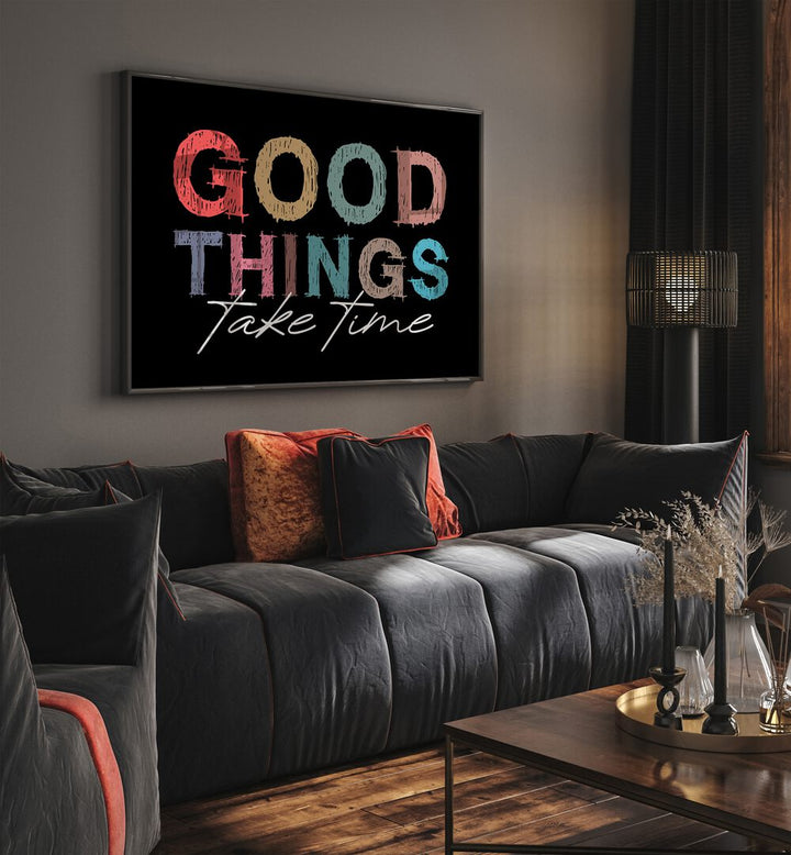 Good Things Quotes and Typography Posters in Black Plain Frame placed on a wall in living room behind a sofa