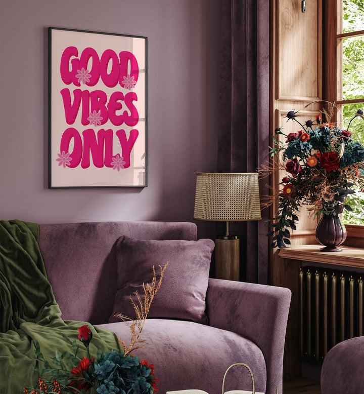 Good Vibes Print Quotes and Typography Posters in Black Plain Frame placed on a wall behind a sofa