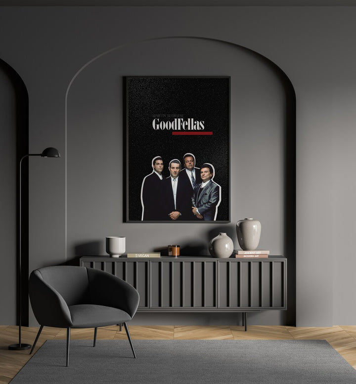 Goodfellas By Grishma Korjani Movie Posters in Black Plain Frame placed on a Grey Colored Wall above a Console Table in the Drawing Room