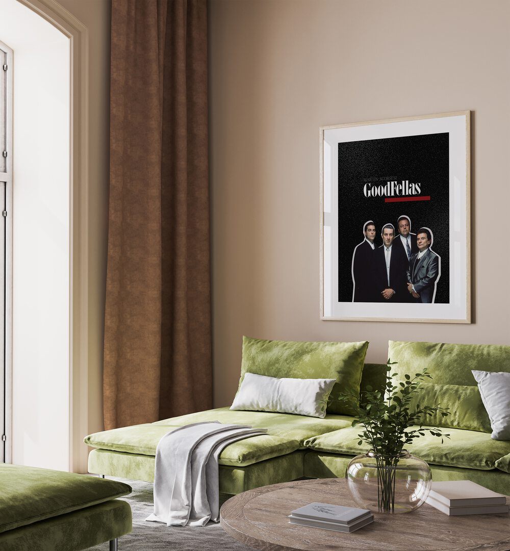 Goodfellas By Grishma Korjani Movie Posters in Oak Wood Frame With Mount placed on a Beige Colored Wall near a Green Sofa in the Living Room