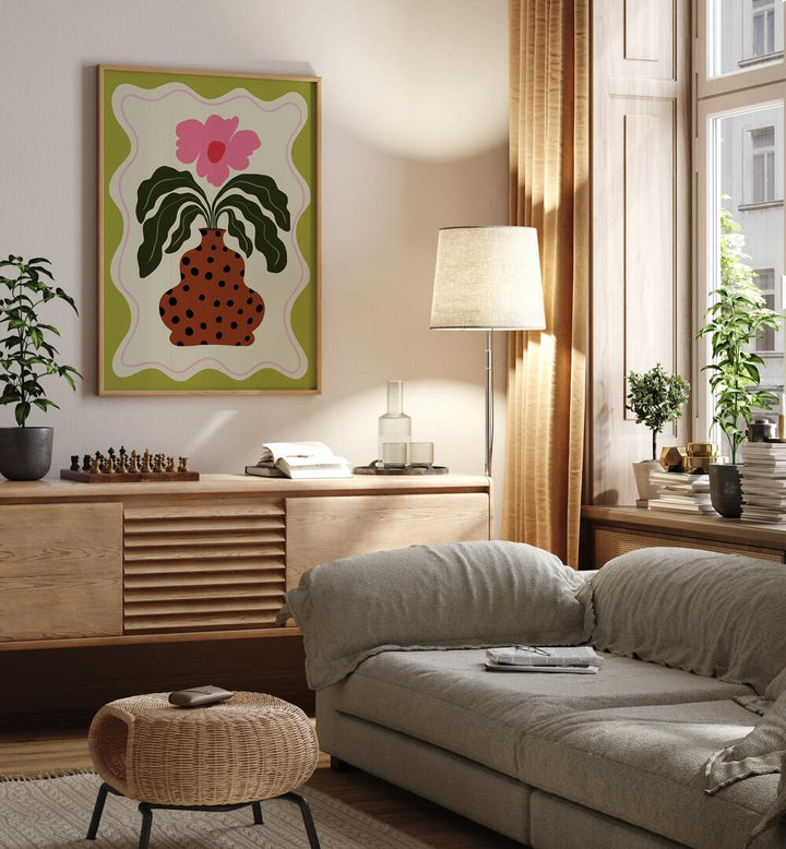 Grace By Miho Art Studio Botanical Art Prints Floral Paintings in Oak Wood Plain Frame placed on a Cream Colored Wall above a Console Table near a Beige Sofa in the Living Room