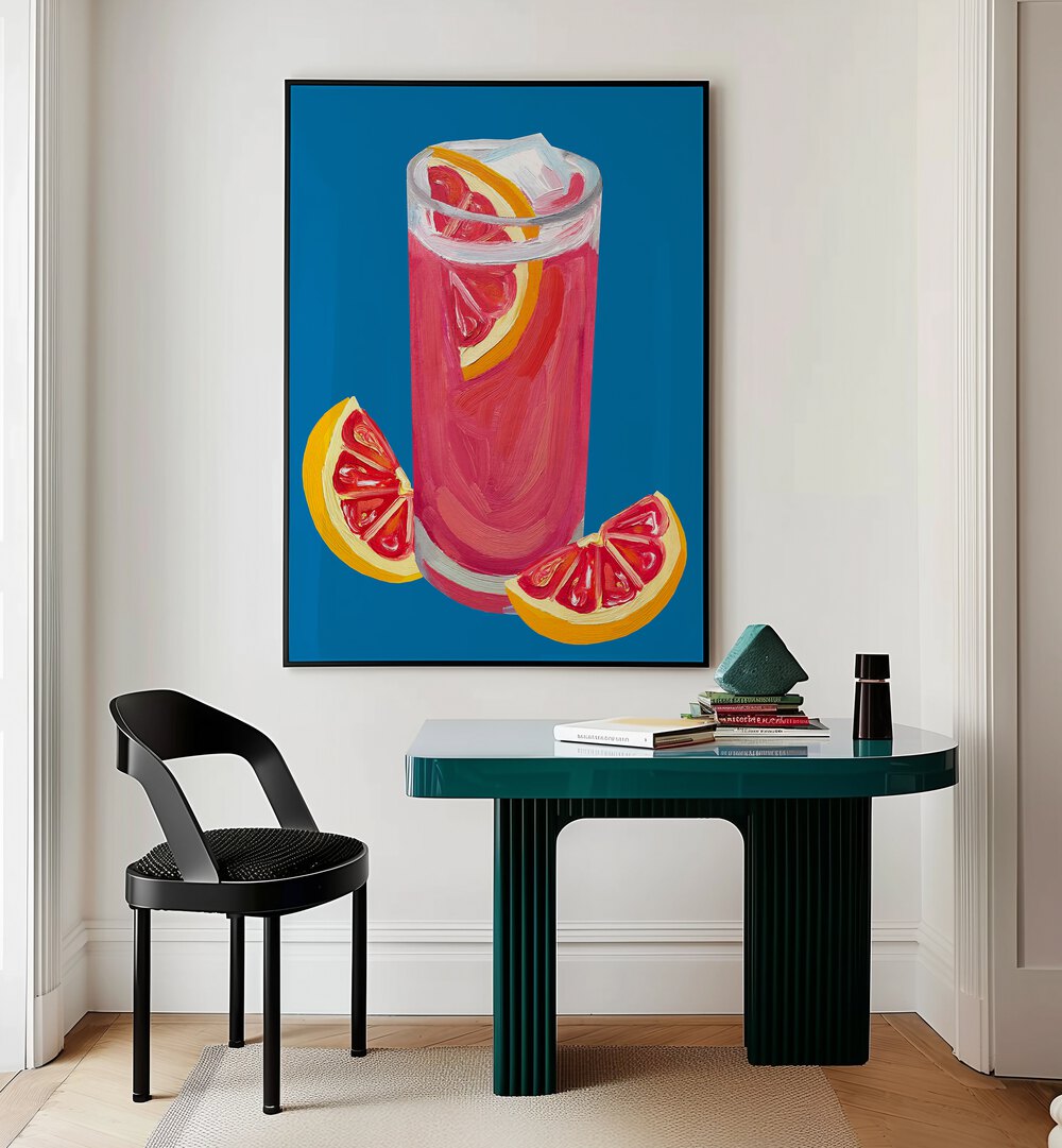 Grapefruit Paloma Blue by Alice Straker Bar Posters Bar Art Prints in Black Plain Frame placed on a wall behind a study table