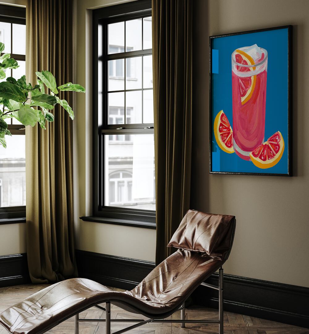 Grapefruit Paloma Blue by Alice Straker Bar Posters Bar Art Prints in Black Plain Frame placed on a living room wall behind a chair and beside a window