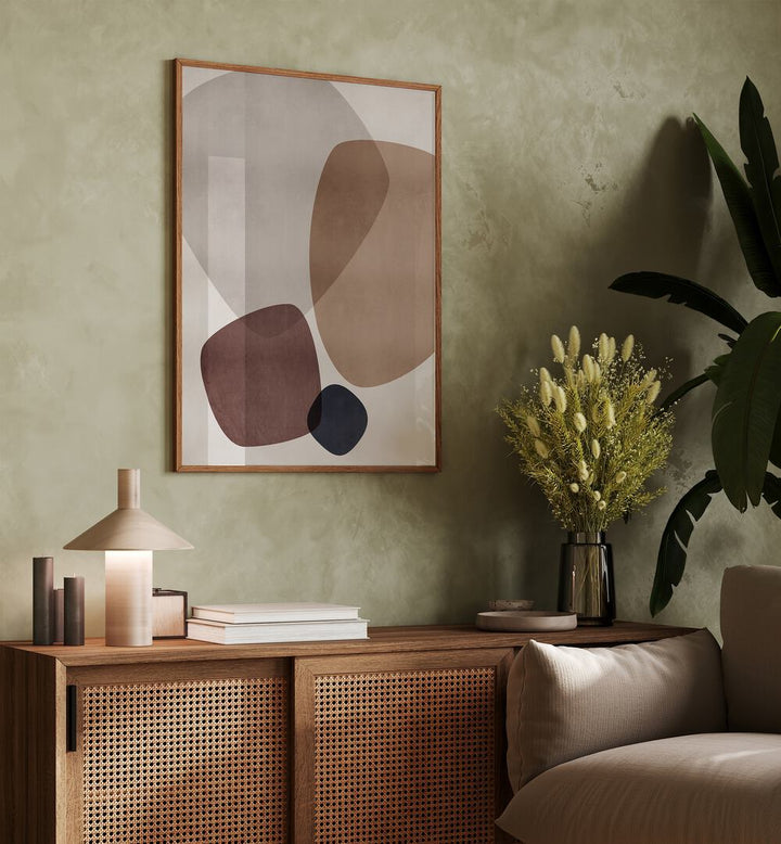 Graphic Dunes By Mareike Bohmer Abstract Art Abstract Paintings in Oak Wood Plain Frame placed on a Green Colored Wall above a Console Table near a Sofa in the Living Room 