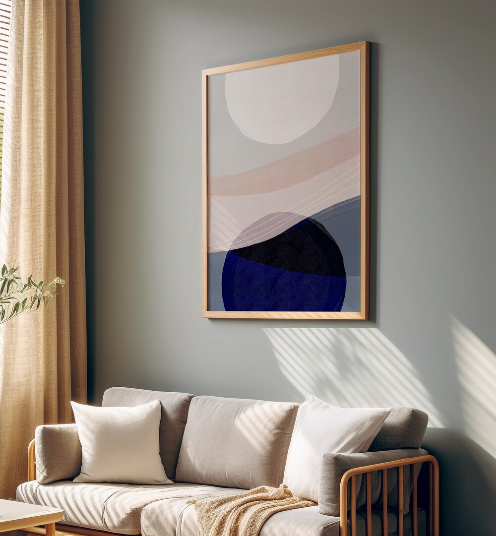 Graphic Tides By Mareike Bohmer Abstract Art Abstract Paintings in Oak Wood Plain Frame placed on a Dark Grey Colored Wall near a Sofa in the Living Room