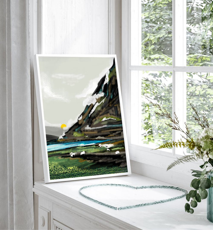 Graze By Uma Gokhale Landscape Paintings in White Plain Frame kept beside a window