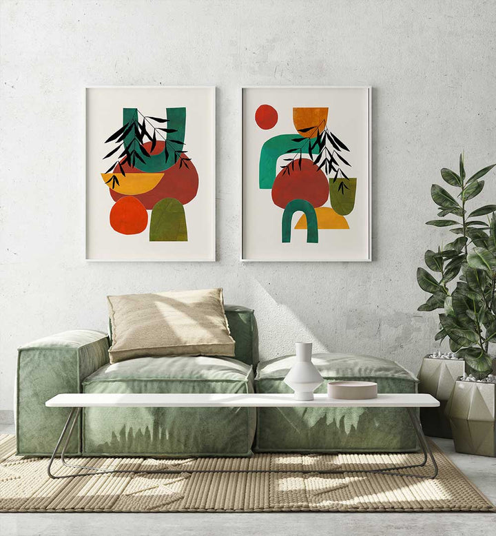 Modern living room with abstract wall art, green sofa, and white coffee table.