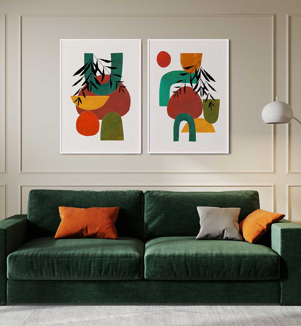 Green sofa with colorful cushions in a room with abstract wall art.