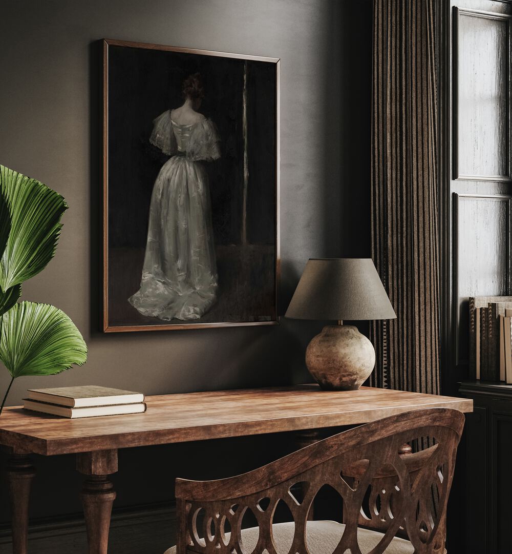 Grief's Silhouette The Weeping Women Gothic Art Prints in Oak Wood Plain Frame hanging on wall above study table beside a window.