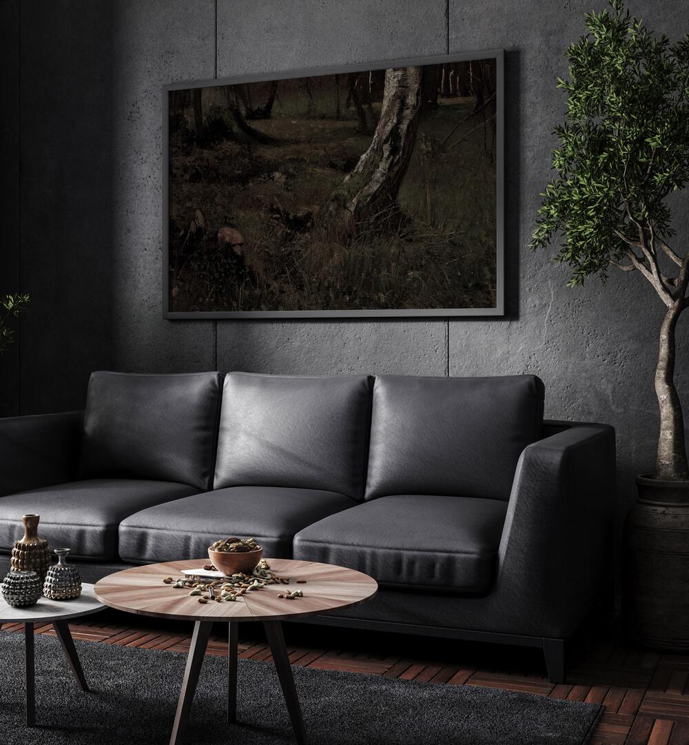 Grim Enchantment A Journey Through The Dark Gothic Art Prints in Black Plain Frame hanging on a wall above black leather couch beside a plant.