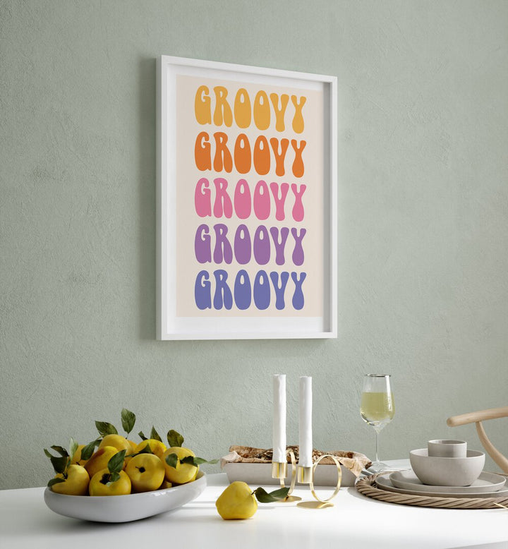 Groovy Quotes and Typography Posters in White Plain Frame placed on a wall behind a dining table