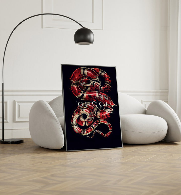 Gucci Fashion Paintings Fashion Posters in Black Plain Frame placed on the floor near a White Sofa in the Living Room