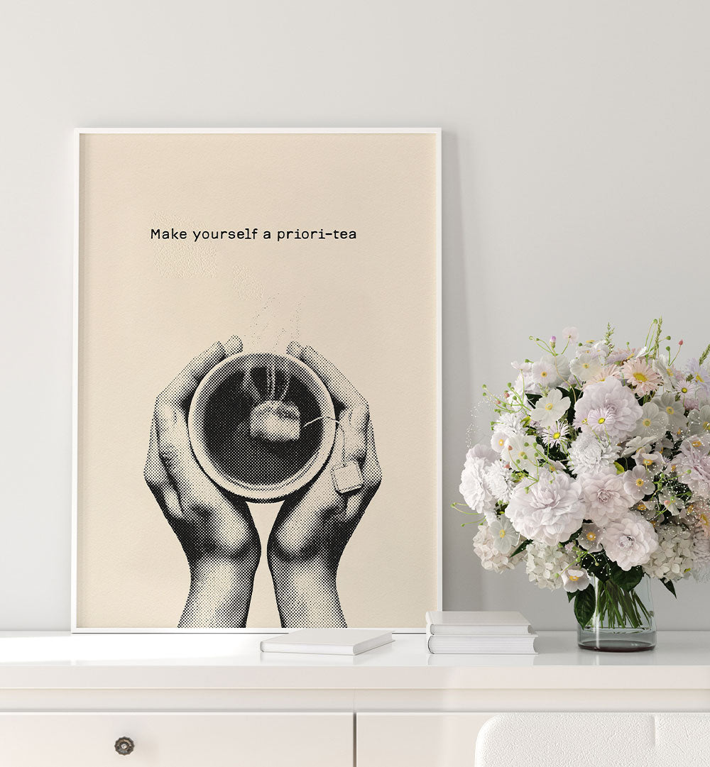 HANDS HOLDING TEA CUP