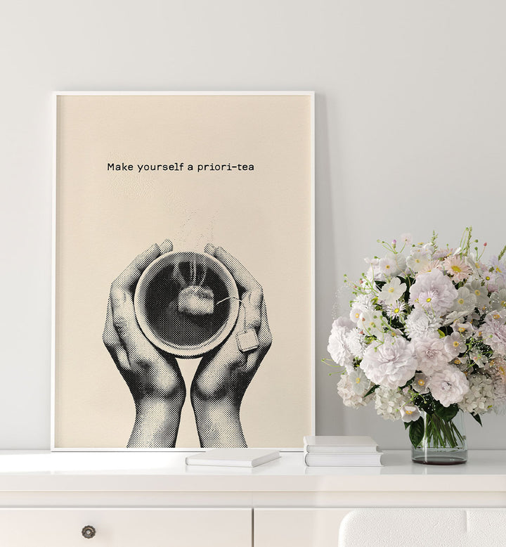 HANDS HOLDING TEA CUP