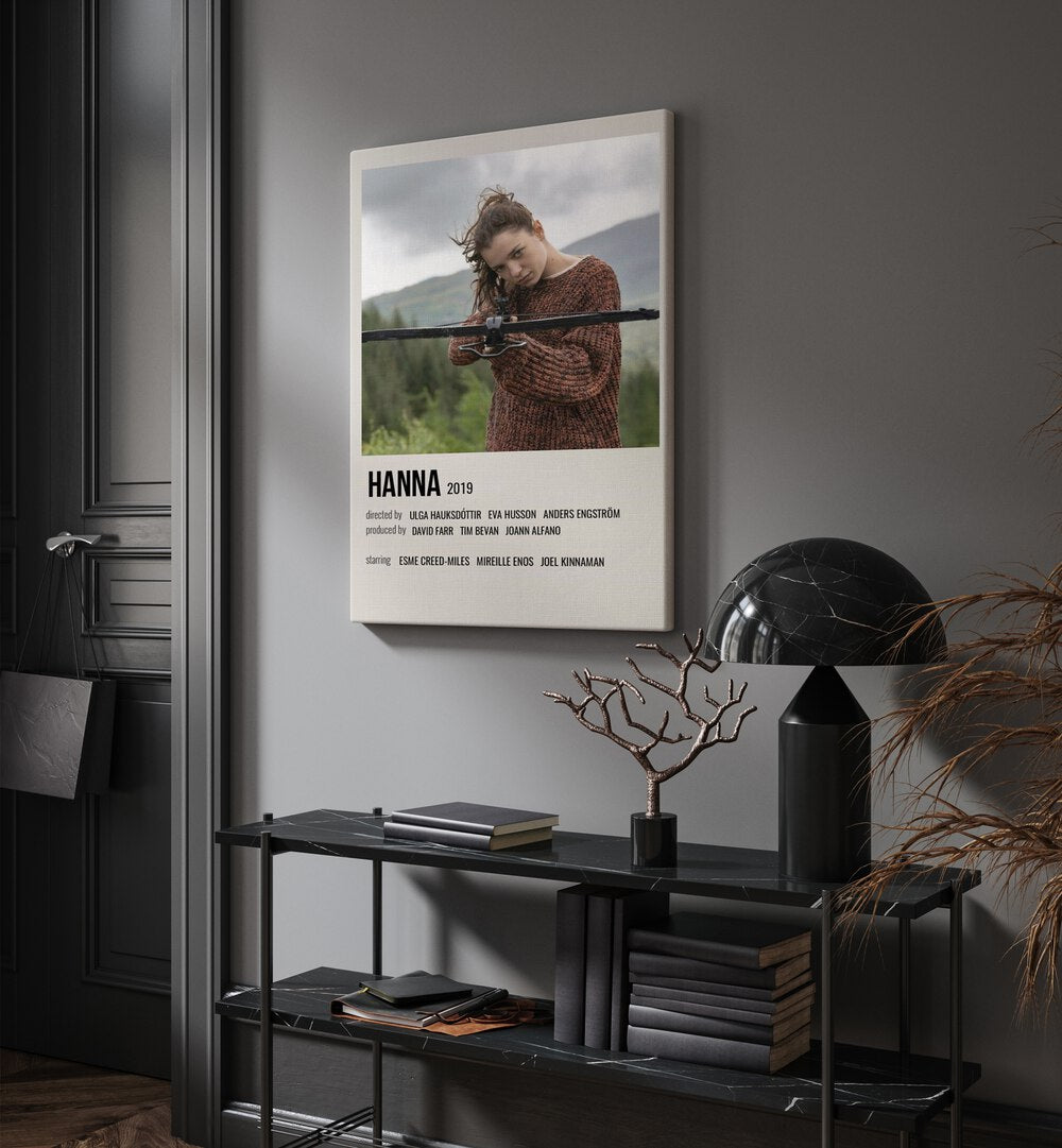 HANNA 2019 MOVIE POSTERS in Gallery Wrap hanging on wall above console table beside door