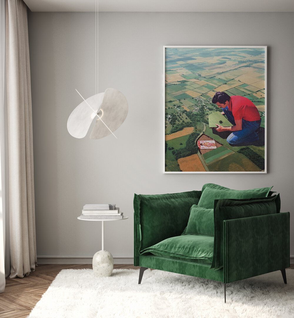 Hide And Seek Surreal Art Painting Artwork in plain white frame beside a green sofa on a white wall