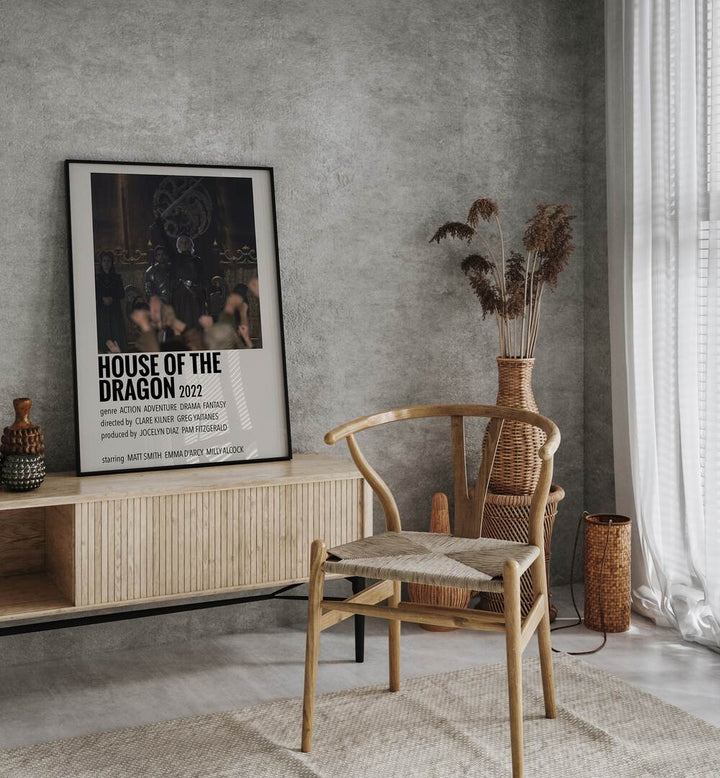 HOUSE OF THE DRAGON 2022 I MOVIE POSTERS in Black Plain Frame placed on a table beside chair