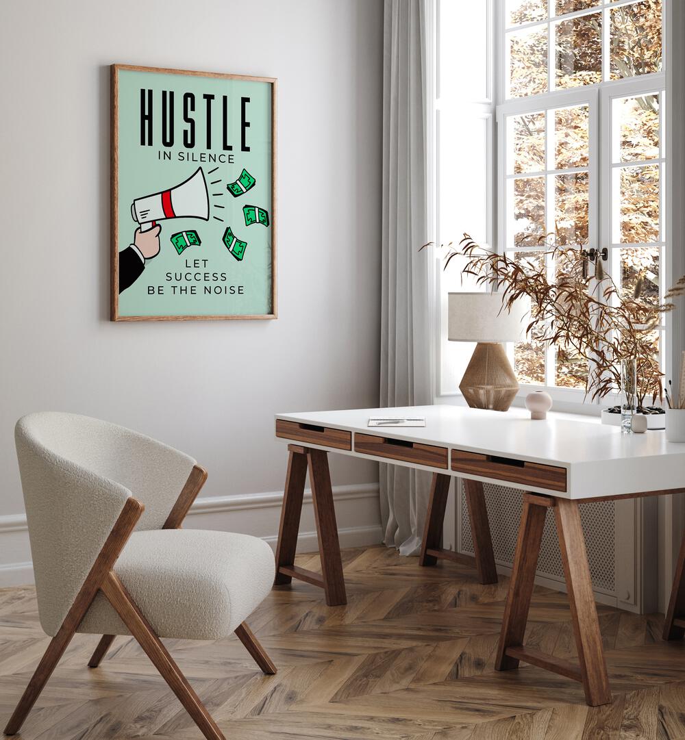 Hustle in Silence Money Art Artwork in oak wood frame hanging on white wall near sitting space