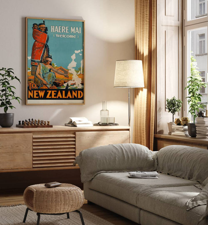 Haere Mai Welcome-to New Zealand  Travel Posters in Oak Wood Plain Frame placed on a wall behind a console table 