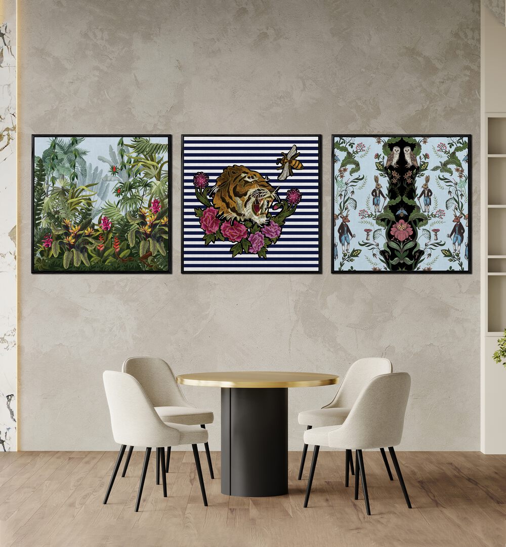 Hakuna Matata Set Set Of 3 Paintings in Black Plain Frame placed on a wall behind table and chairs