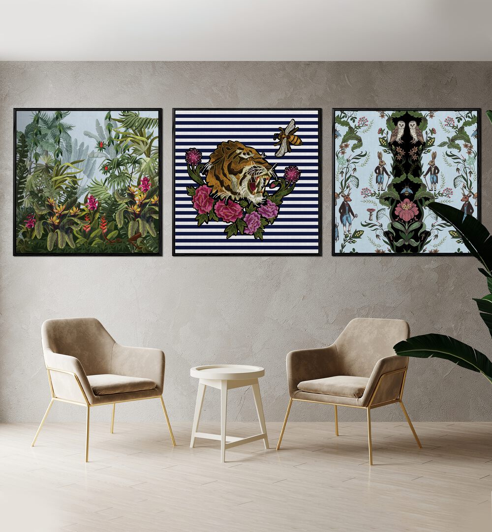 Hakuna Matata Set Set Of 3 Paintings in Black Plain Frame placed on a wall behind a table and chairs