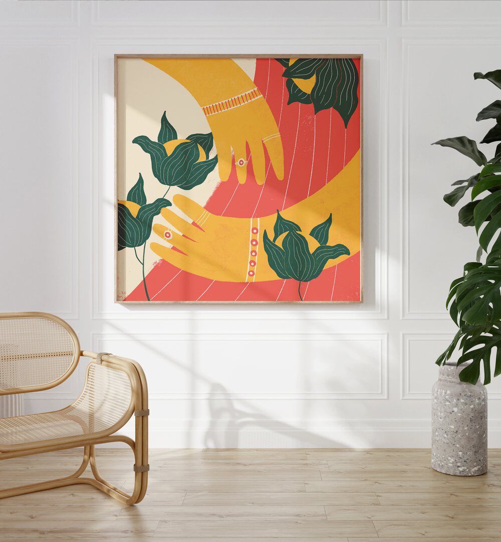 Hands by Shriya Bhattacharya Art Prints in Oak Wood Plain Frame on a white wall beside a plant