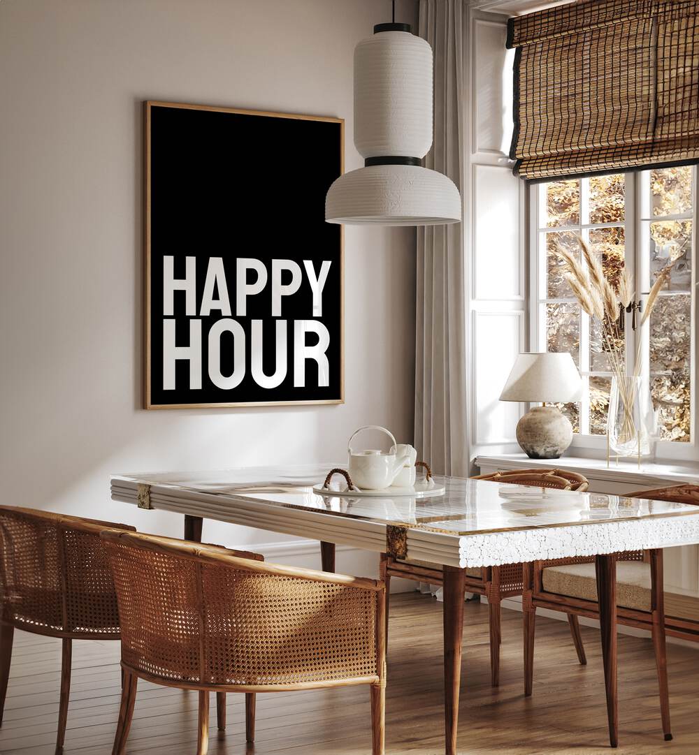 Happy Hour by Athene Fritsch Quotes and Typography Posters in Oak Wood Plain Frame placed on a wall in a dining room area beside a window and behind a dining table