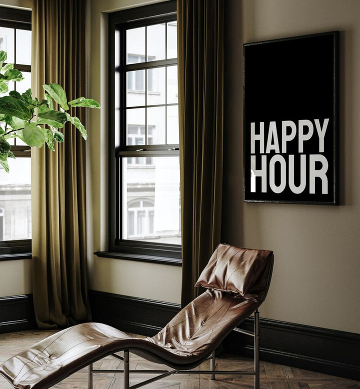 Happy Hour by Athene Fritsch Quotes and Typography Posters in Black Plain Frame placed on a living room wall behind a chair and beside a window