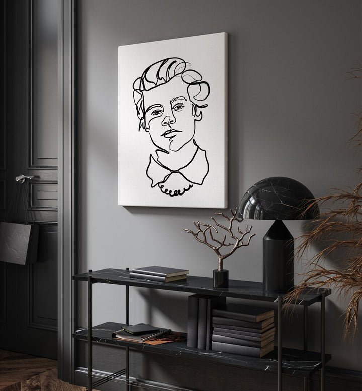 Harry Styles by Hanna Lee Tidd Line Art Paintings Line Art Prints in Gallery Wrap placed on a wall behind a table and beside a door