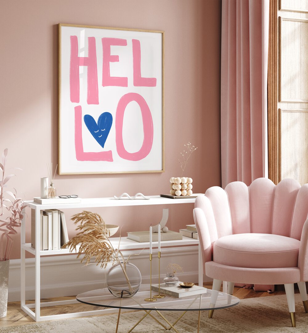 Hello by Athene Fritsch Quotes Posters Wall Art Prints in Oak Wood Plain Frame placed on a wall behind a table