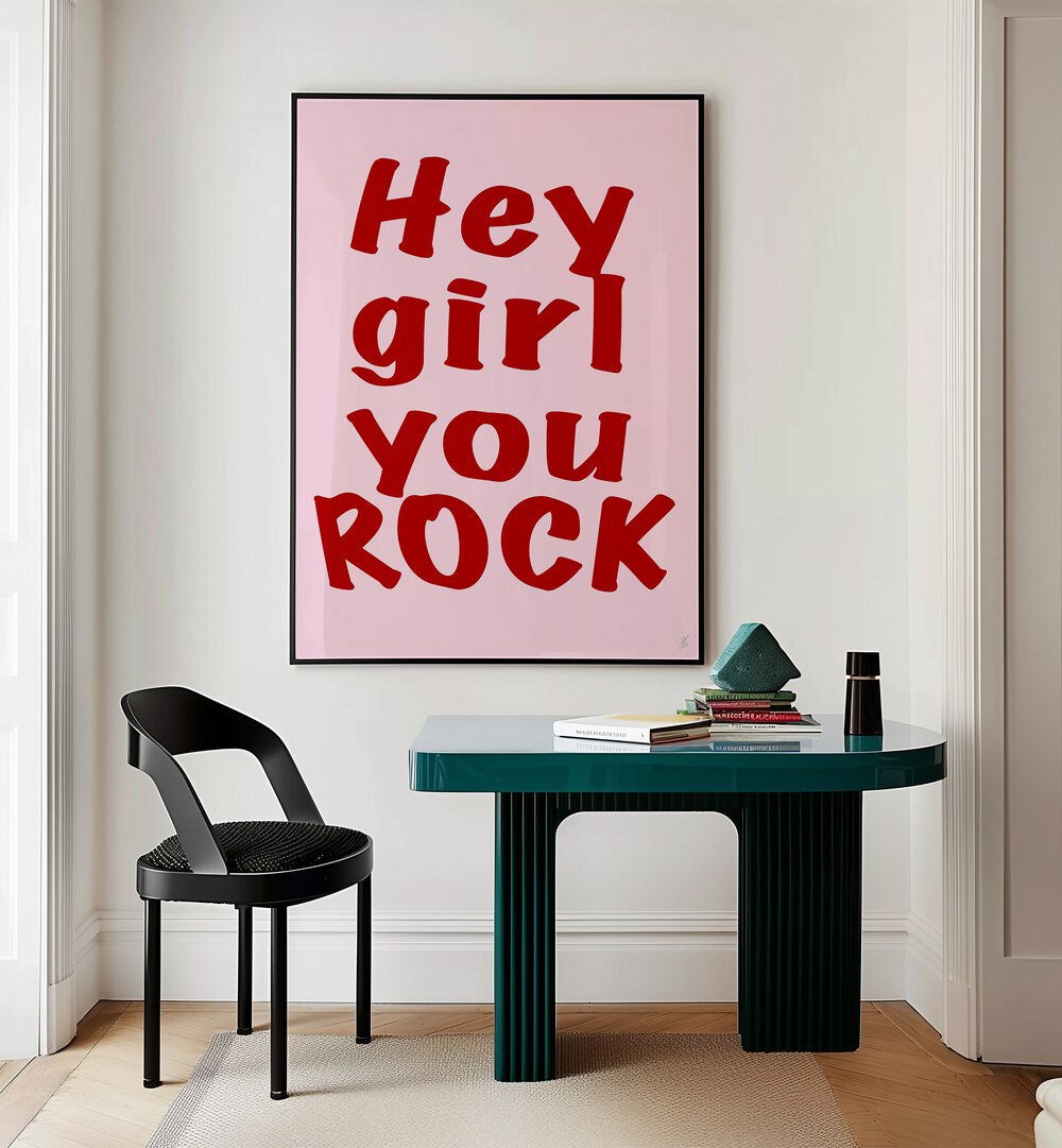 Hey Girl You Rock by Anne-marie Volfova Quotes and Typography Posters in Black Plain Frame placed on a wall behind a study table