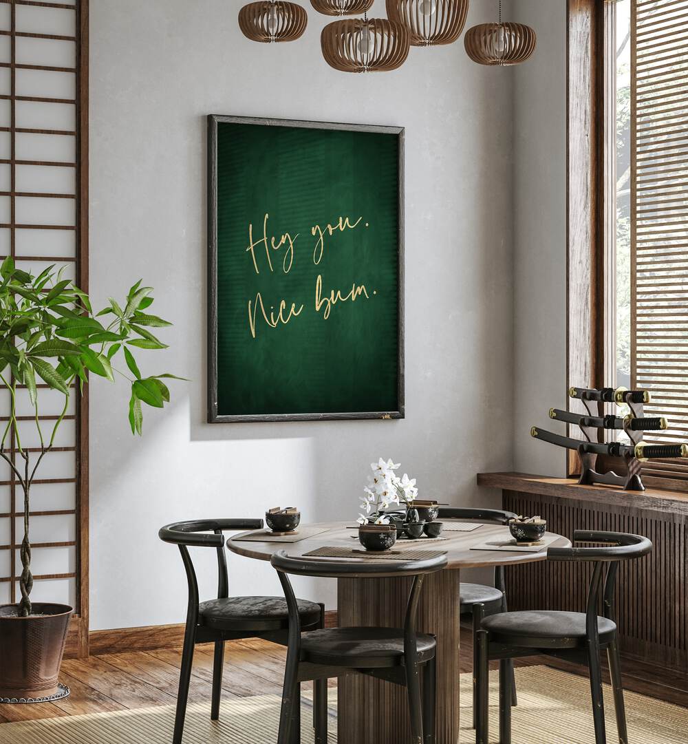 Hey You Nice Bum Emerald Green By Aureous Quotes And Typography Posters in Dark Wood Plain Frame placed on a White Colored Wall near a Coffee Table in the Dining Room